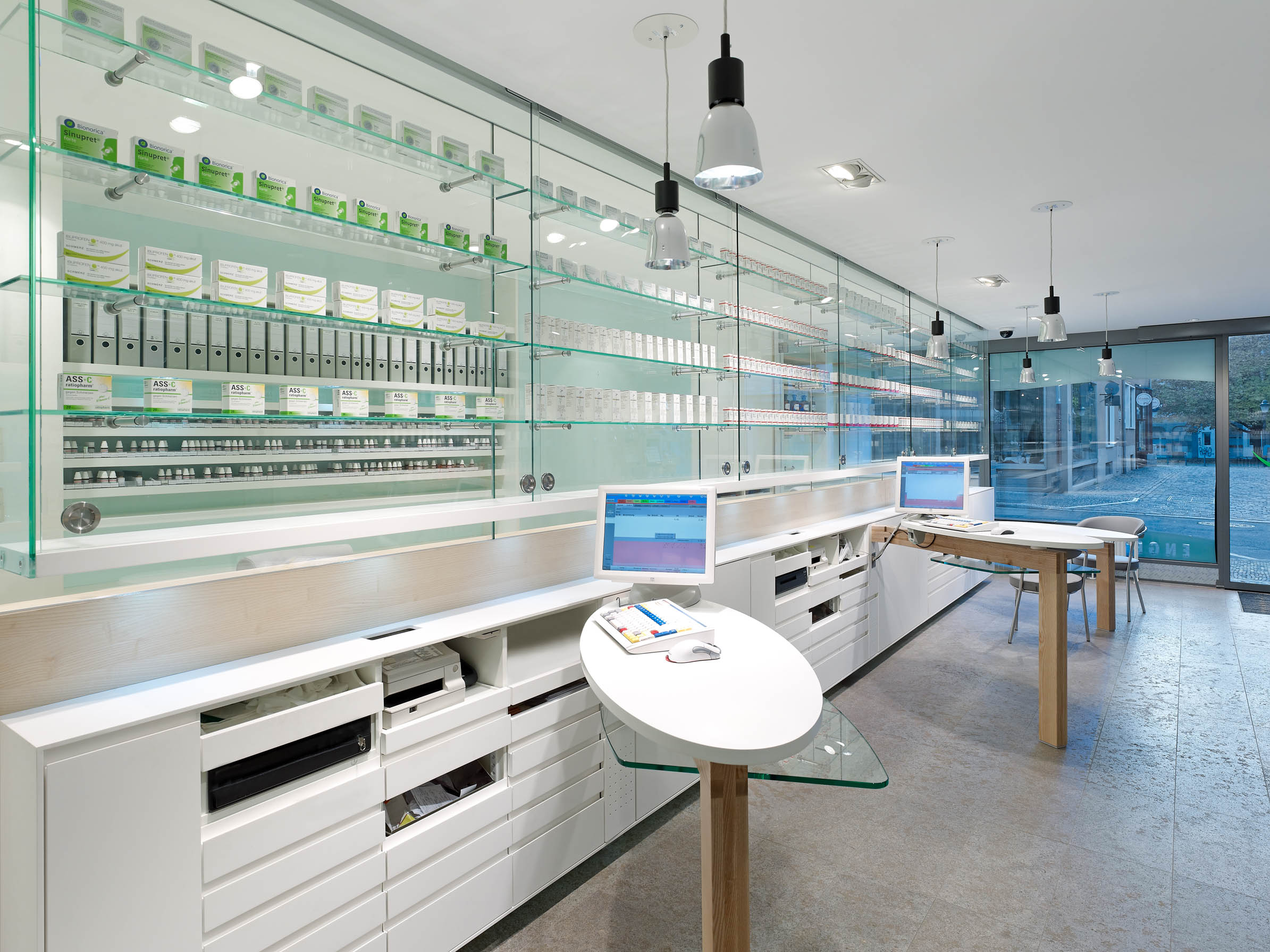 Prescription counters directly connected to the glazed medicine display
