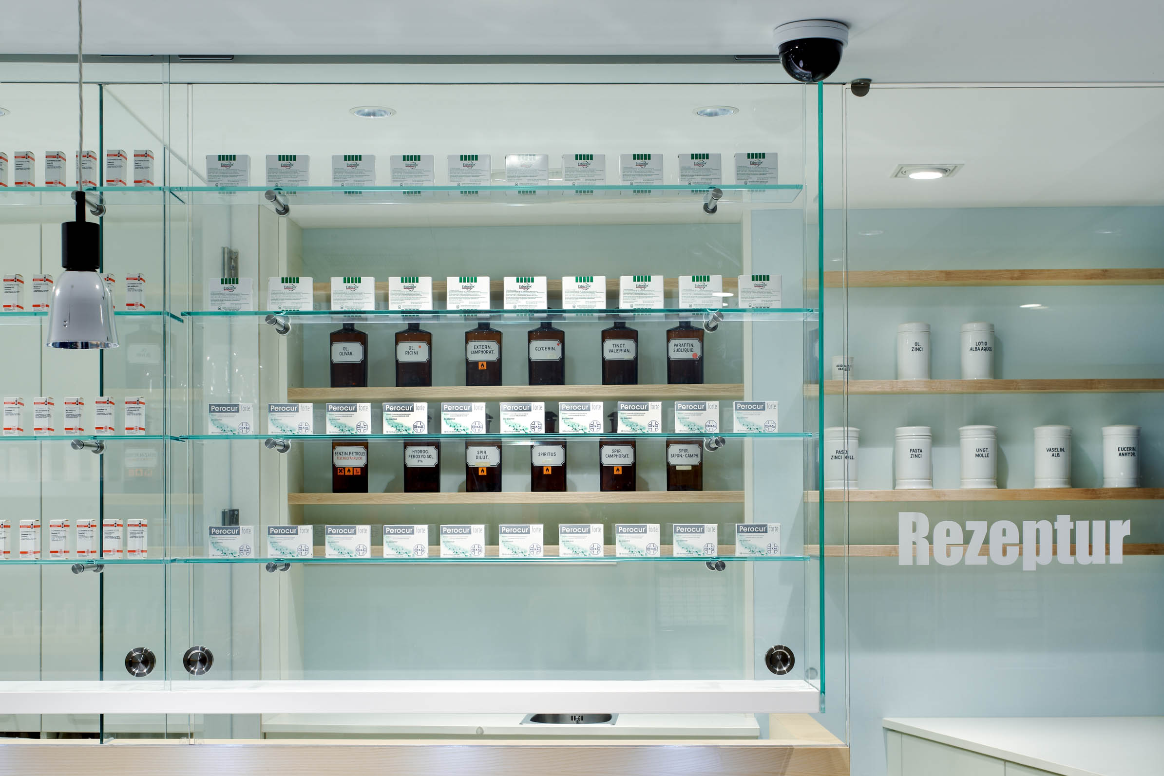 Compounding laboratory aligned with the glazed medicine display