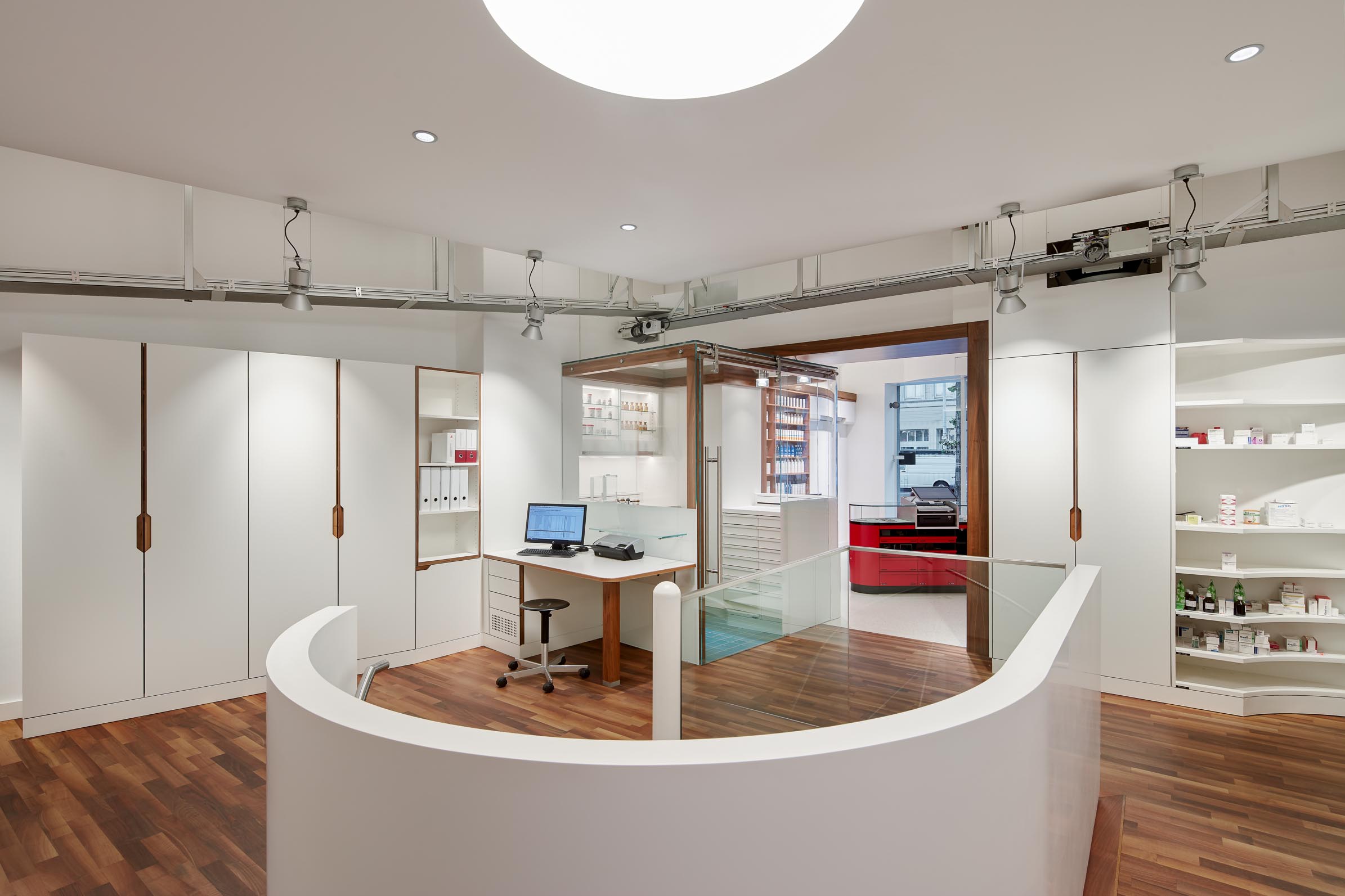 Working area with compounding laboratory and spiral staircase